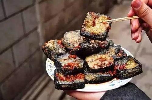 臭豆腐爆料新闻报道文案,揭秘街头美食背后的秘密  第2张